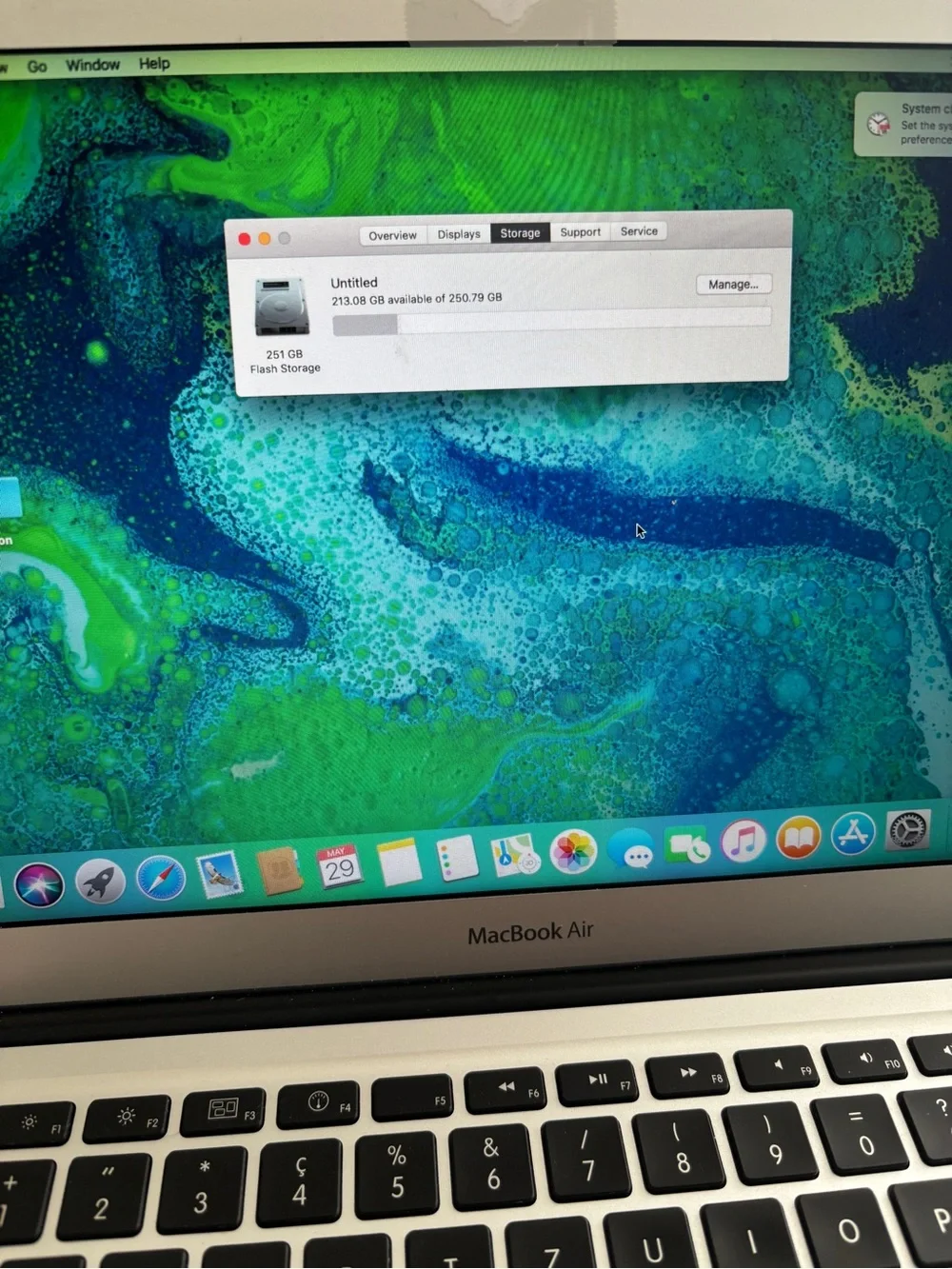 Apple Laptop in Silver with Charger Cord
